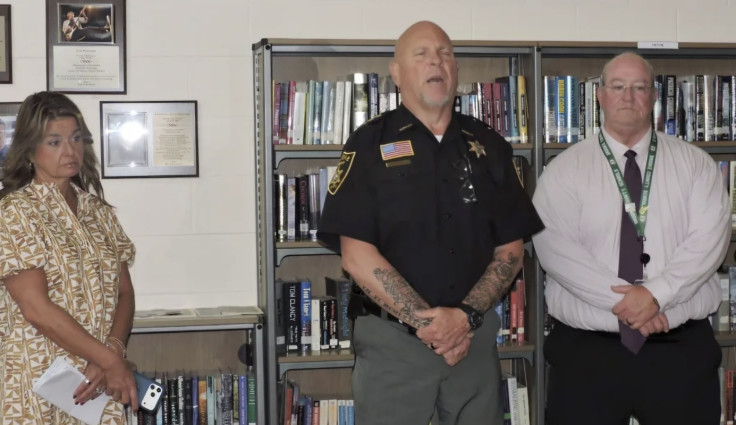 A school principal facing felony charges in West Virginia