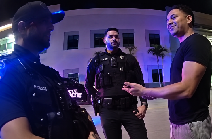 Ex-UFC fighter Marlon Moraes arresting a motorist