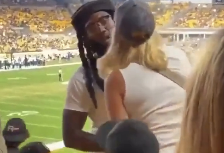 A fight between a Black man and a white woman