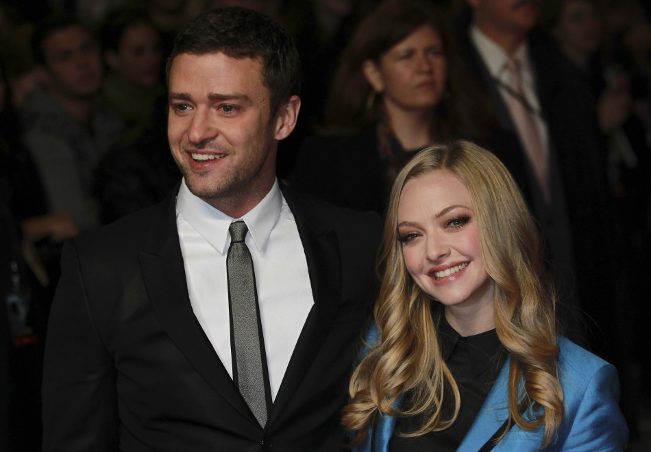 Justin Timberlake L and Amanda Seyfried pose for photographers at the British premiere of the film quotIn Timequot at the Curzon Mayfair cinema in London October 31, 2011