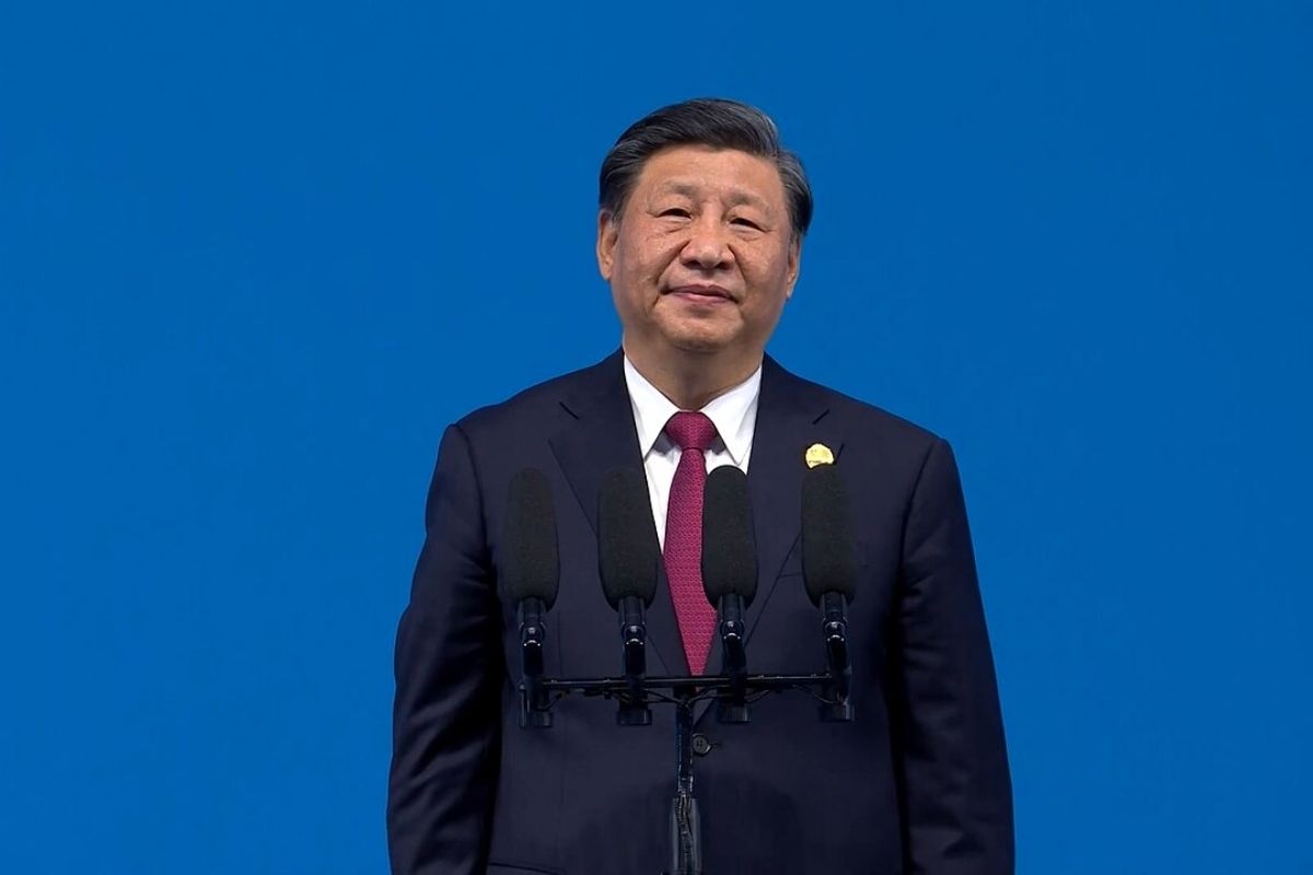 Xi Jinping in Blue Backdrop