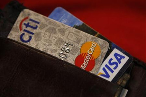 Credit cards are pictured in a wallet in Washington