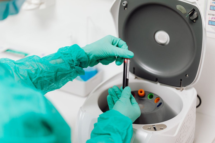 Laboratory Technician Handling Research Samples