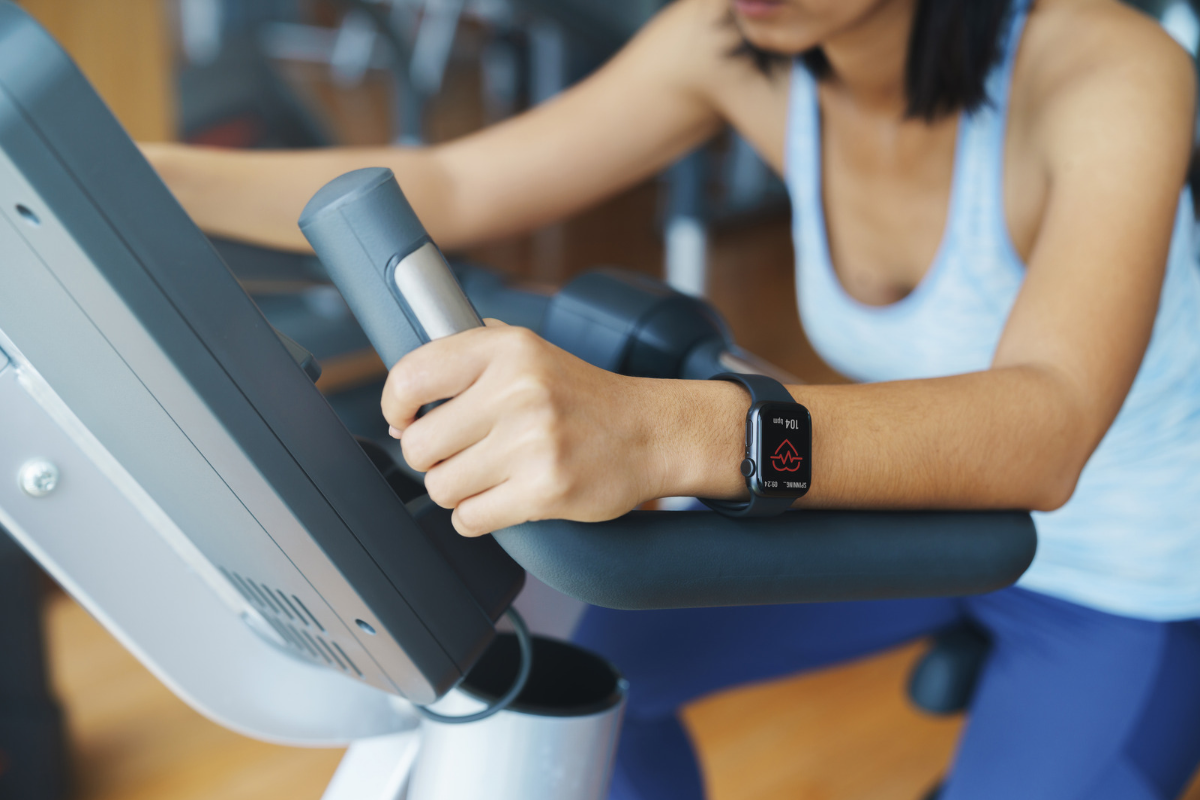 A person wearing a fitness smartwatch