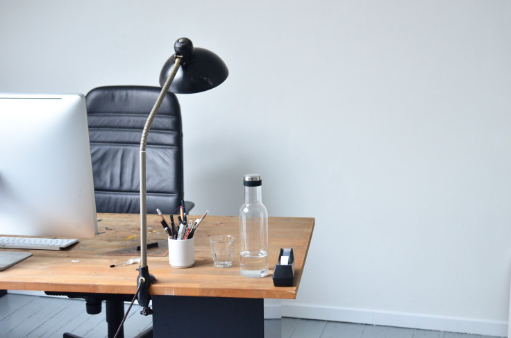 Office desk with water bottle