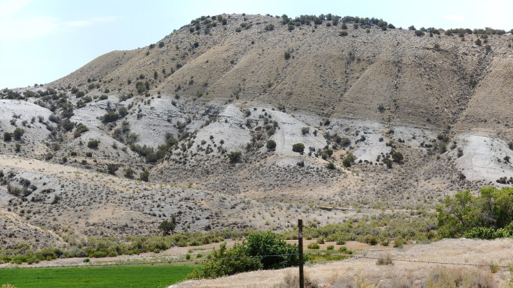 Geological formations and distant hills in Utah's Uintah Basin