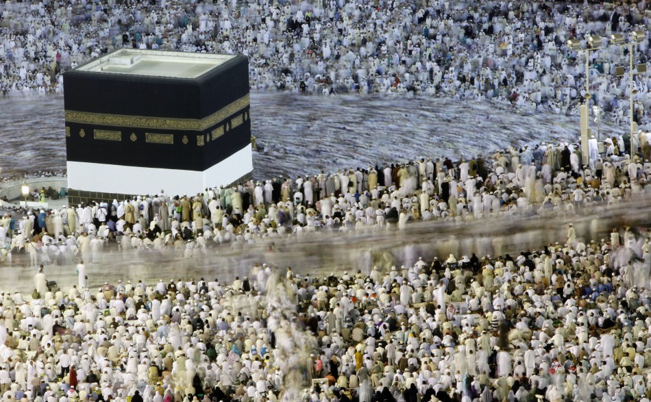 Muslim pilgrims circle the Kaaba at the Al-Masjid al-Haram Grand mosque in Mecca