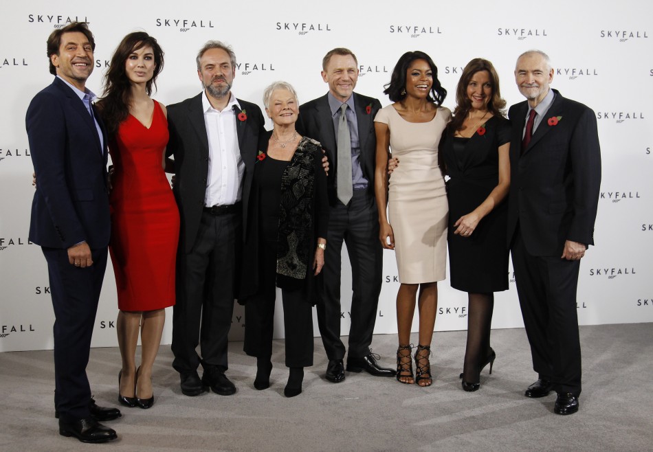 Director Sam Mendes 3rd L poses with cast members L-R Javier Bardem, Berenice Marlohe, Judi Dench, Daniel Craig and Naomie Harris along with producers Barbara Broccoli and Michael G. Wilson during a photocall to launch the start of production of the n