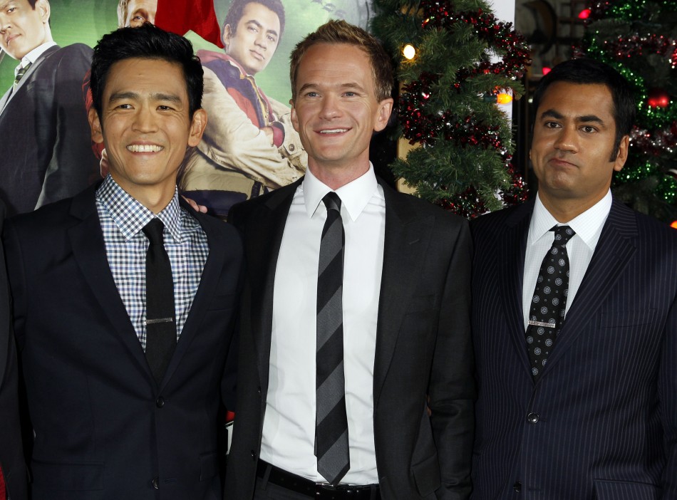 Actors John Cho, Neil Patrick Harris, and Kal Penn pose at the premiere of the new film quotA Very Harold  Kumar 3D Christmasquot in Hollywood