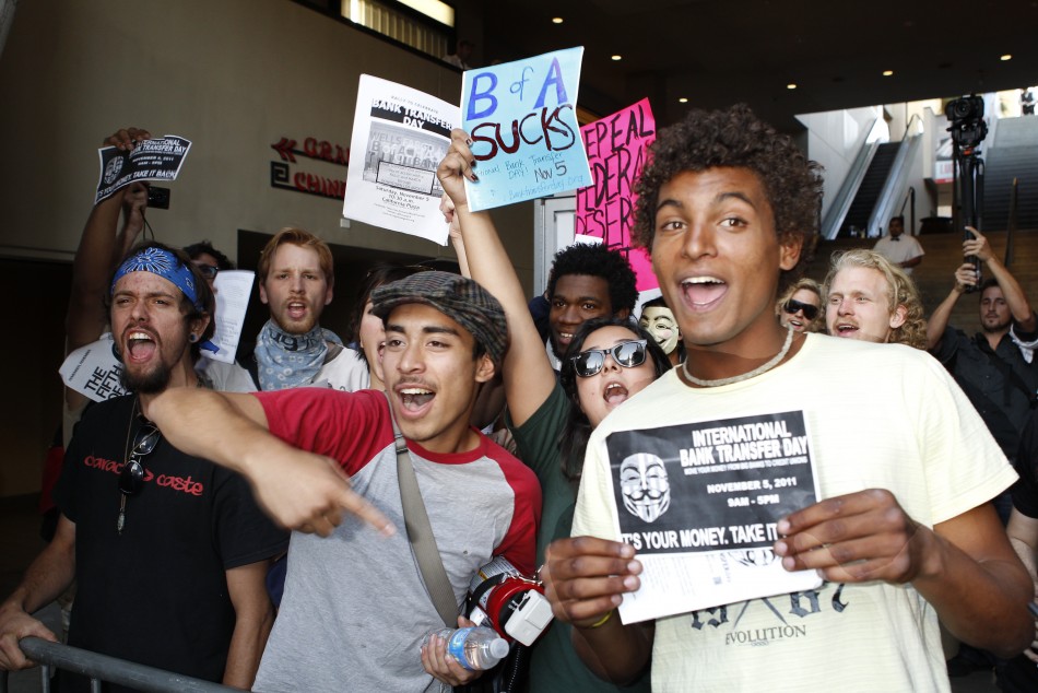Protestors supporting International Bank Transfer Day demonstrate before the premiere of quotA Very Harold  Kumar 3D Christmasquot in Hollywood