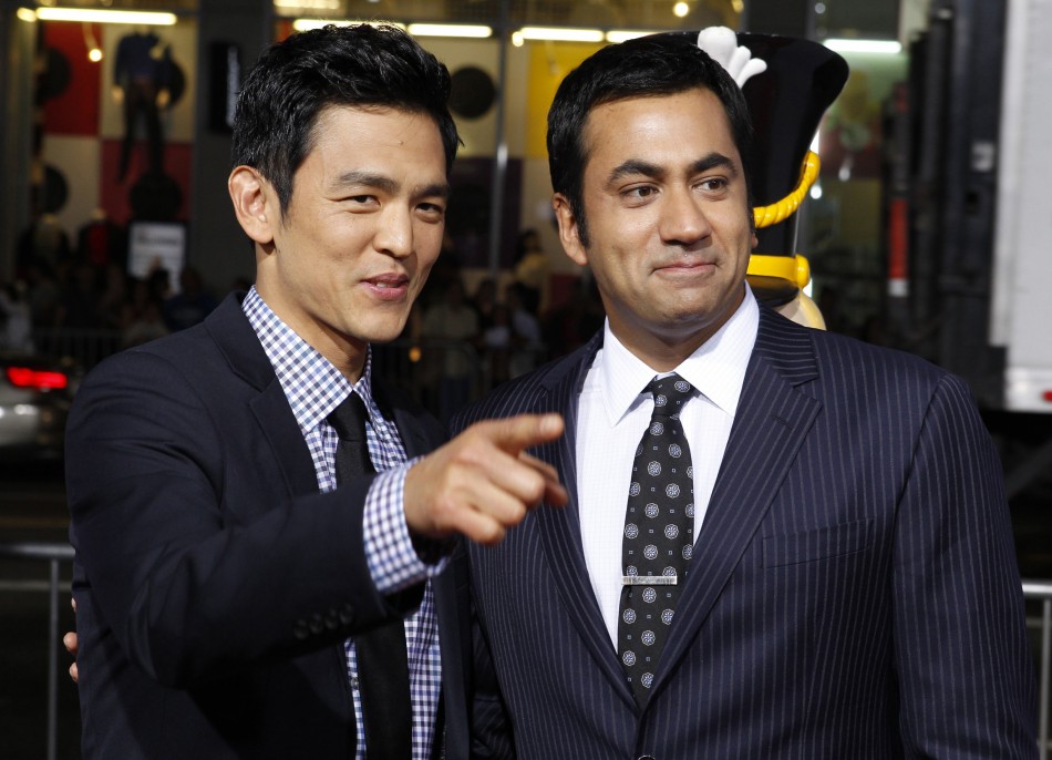 Actors John Cho and Kal Penn pose at the premiere of the new film quotA Very Harold  Kumar 3D Christmasquot in Hollywood