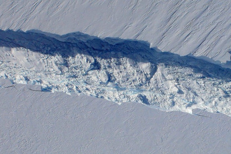 a close-up view of the crack spreading across the ice shelf of Pine Island Glacier, with details of the boulder-like blocks of ice that fell into the rift when it split