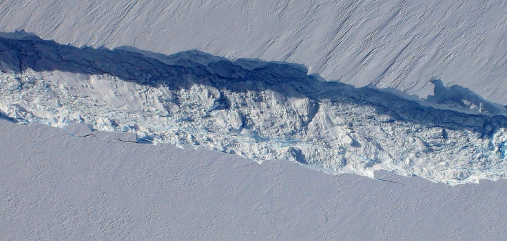 a close-up view of the crack spreading across the ice shelf of Pine Island Glacier, with details of the boulder-like blocks of ice that fell into the rift when it split