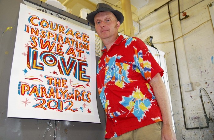 London 2012 Paralympic poster designer Bob and Roberta Smith with his poster Love