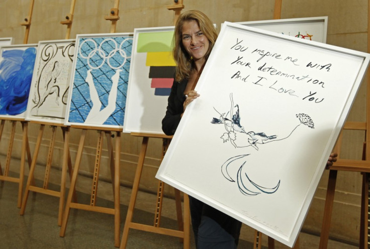 Artist Tracey Emin poses with her Paralympic poster &quot;Birds 2012&quot; at the unveiling ceremony of the official Olympic and Paralympic posters for London 2012 at the Tate Britain gallery in London November 4, 2011.