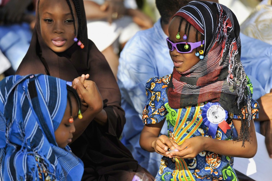 Girls attend prayers marking the Muslim festival of Eid al-Adha in the Nigerian capital, Abuja