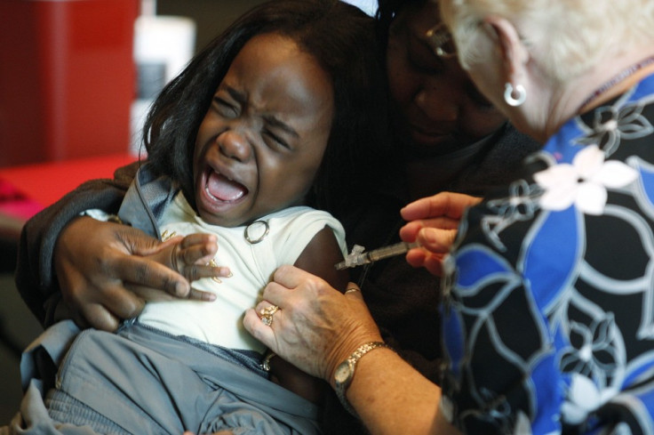 A single shot vaccination will provide protection against all kinds of flu viruses for life including bird flu and swine flu. Here Fofu, 4, screams while her mother Abena holds her as a nurse injects a shot of the H1N1 flu vaccine, in Arlington, Texas No
