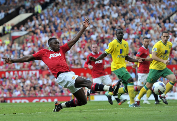 Manchester United's Welbeck stretches for a shot during their English Premier League soccer match against Norwich City in Manchester