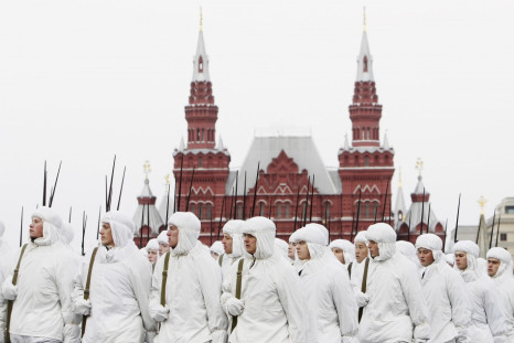Russian servicemen in historical uniforms take part in a military parade in Moscow's Red Square