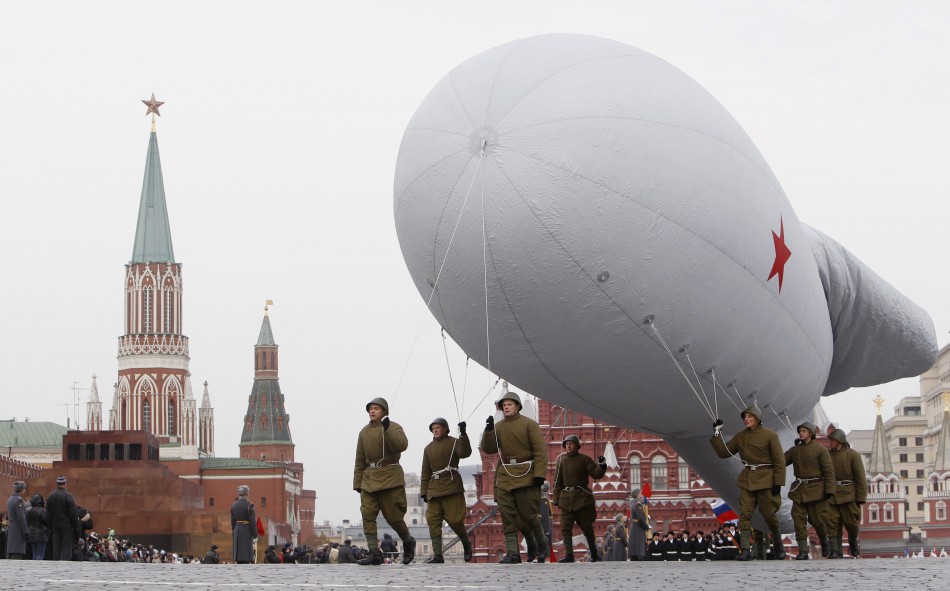 Russian servicemen prepare a World War Two balloon, as part of a military parade in Moscows Red Square