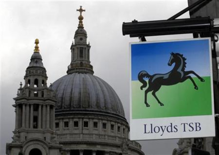 A Lloyds bank branch sign is seen near St Paul's Cathedral in the City of London