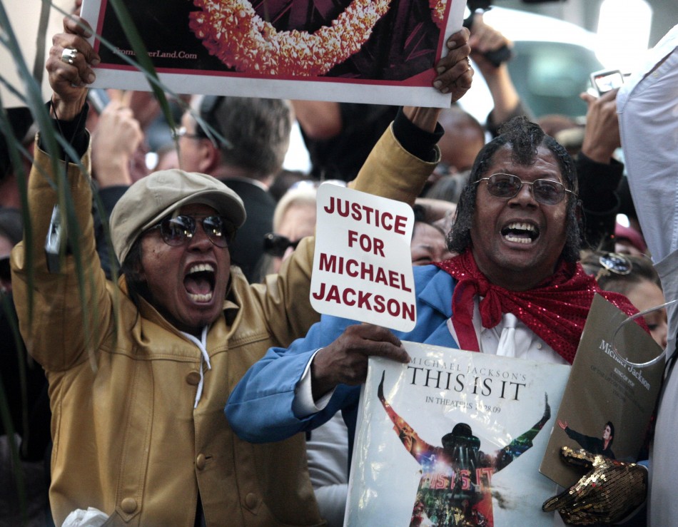 Fans of Michael Jackson react outside the courthouse