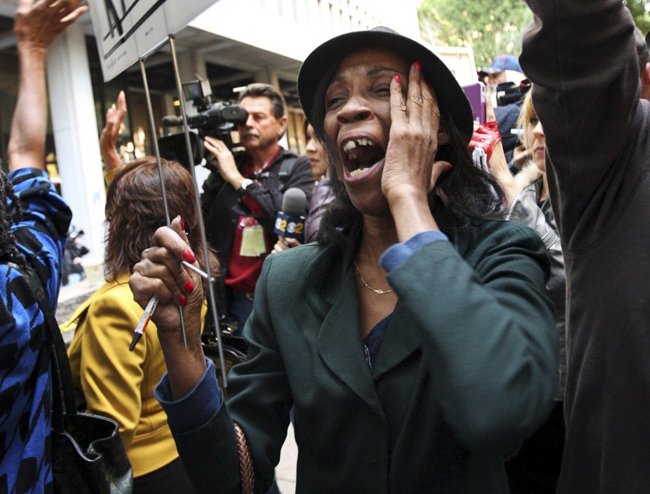A fan of Michael Jackson react outside the courthouse