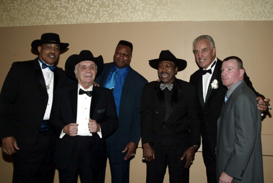 Boxers including Wepner, Lamotta, Holmes, Frazier and Cooney pose at a fundraiser benefit in New York.