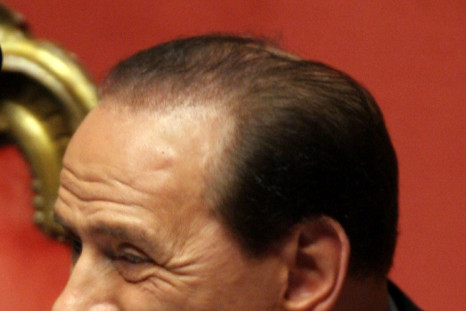 Italy's Prime Minister Silvio Berlusconi announces resignation in  2005