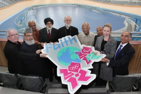 The faith leaders, belonging to nine different faiths, help unveil the new London 2012 Faith badge inside the Velodrome.