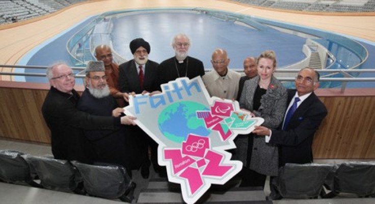 The faith leaders, belonging to nine different faiths, help unveil the new London 2012 Faith badge inside the Velodrome.