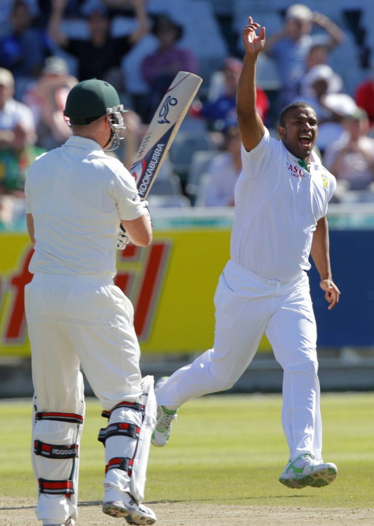 South Africa&#039;s Vernon Philander celebrates after taking the wicket of Australia&#039;s Brad Haddin during the second day of their first test cricket match in Cape Town.