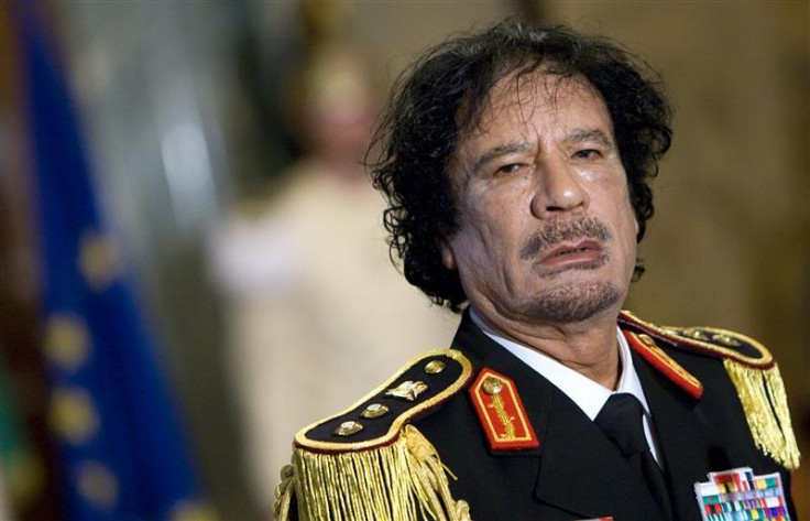 File photo of Libya&#039;s leader Gaddafi looking on during a news conference in Rome