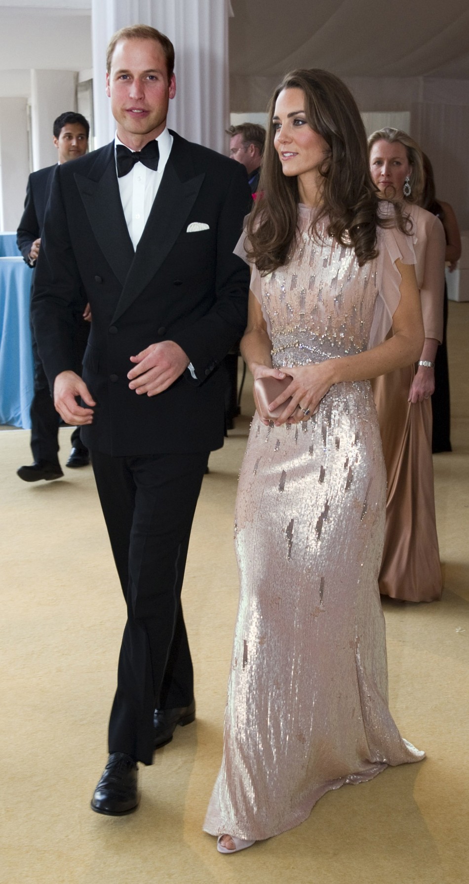 Britains Prince William and his wife Catherine, Duchess of Cambridge arrive at ARK gala dinner at Kensington Palace in London