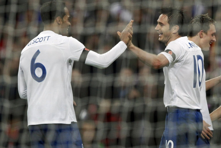 England's Frank Lampard (R) is congratulated by teammate Joleon Lescott after scoring a goal against Spain during their international friendly soccer match at Wembley England's Frank Lampard (R) is congratulated by teammate Joleon Lescott after scoring a goal against Spain during their international friendly soccer match at Wembley