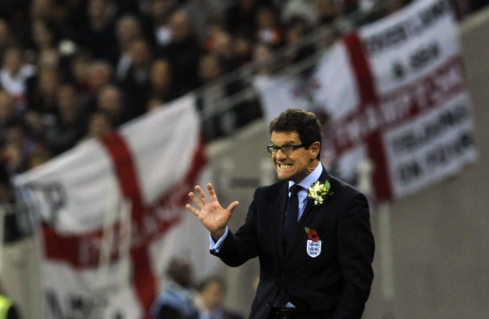 Englands national soccer team coach Capello gestures during their international friendly soccer match against Spain in London
