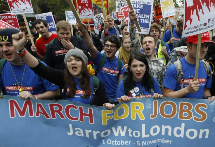 Demonstrators protest against job cuts in central London on November 5, 2011. Many of the demonstrators had marched from Jarrow in north east England, recreating a 1936 protest march against unemployment.