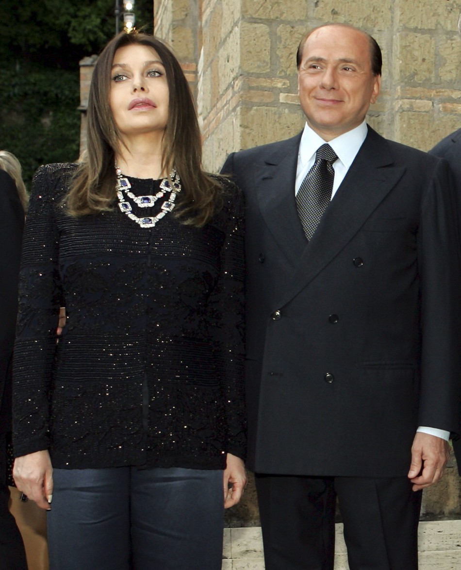 Italys Prime Minister Silvio Berlusconi and his wife Veronica Lario L pose at Villa Madama in Rome in a June 4, 2004 file photo.