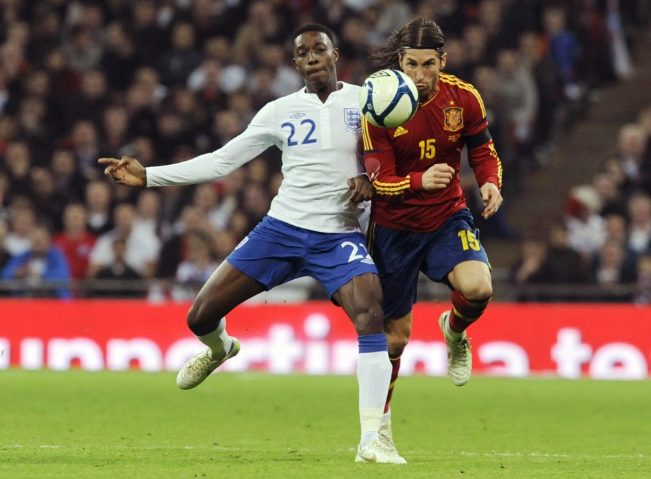 Spains Ramos and Englands Welbeck challenge for the ball during their international friendly soccer match in London