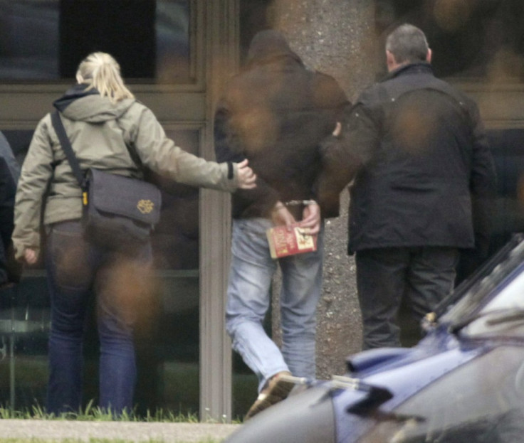 Suspected accomplice of neo-Nazi cell is lead by police officers to the federal state prosecutor in Karlsruhe Suspected accomplice of neo-Nazi cell is lead by police officers to the federal state prosecutor in Karlsruhe