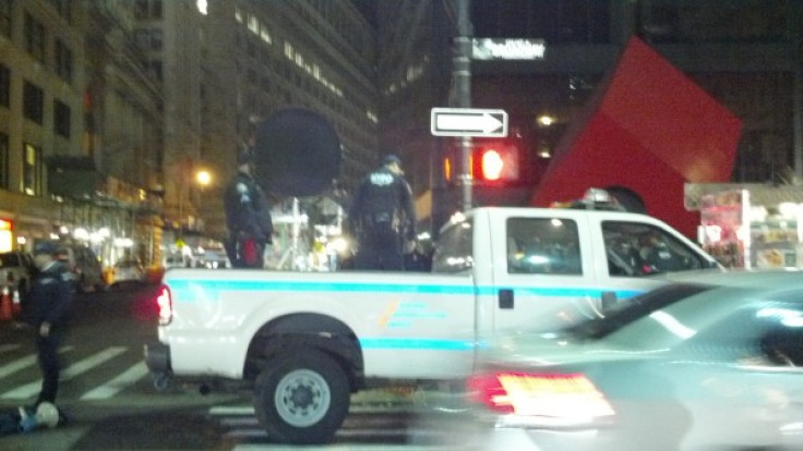 Police use LRAD to disperse the crowd