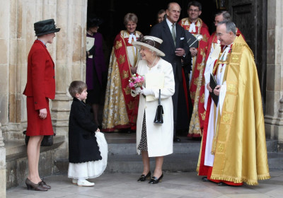 Queen Elizabeth II is given some flowers by Martha Campbell as she leaves a service of celebration to mark the 400th Anniversary of the King James Bible at Westminster Abbey in London. Queen Elizabeth II is given some flowers by Martha Campbell as she leaves a service of celebration to mark the 400th Anniversary of the King James Bible at Westminster Abbey in London.