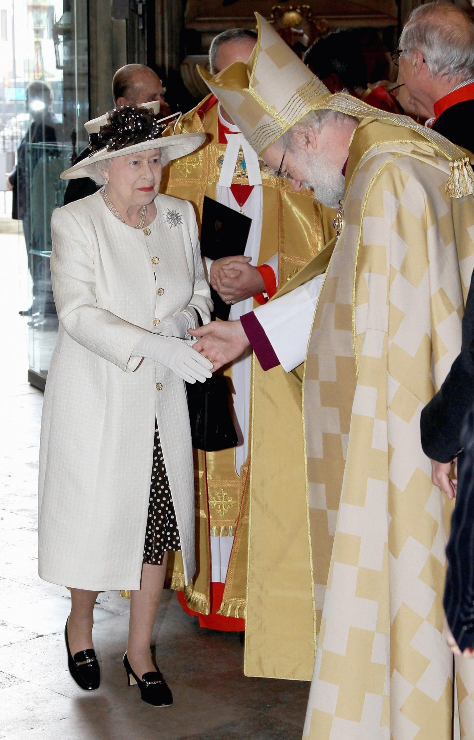 Queen Elizabeth II greets the Archbishop of Canterbury Dr Rowan Williams