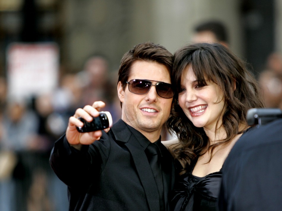 Cast member Tom Cruise takes a self-portrait with his fiancee actress Katie Holmes at the screening of quotMission Impossible IIIquot