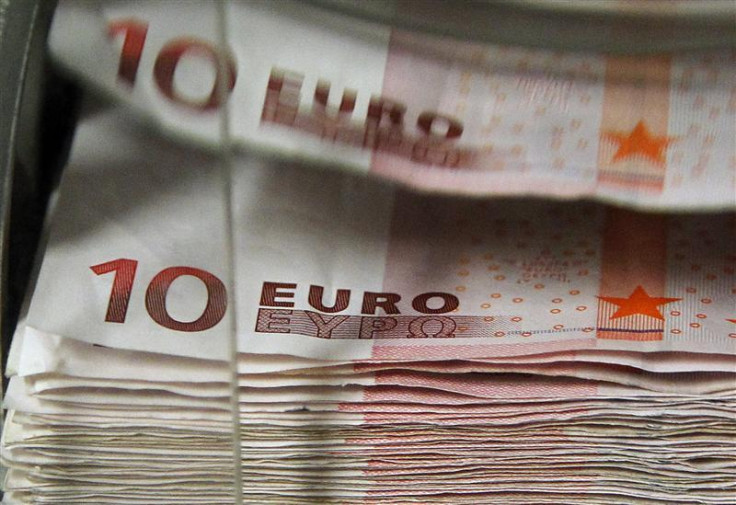 A machine counts and sorts out euro notes at the Belgian Central Bank in Brussels