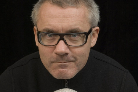 British artist Damien Hirst poses with &#039;For the love of God&#039;.
