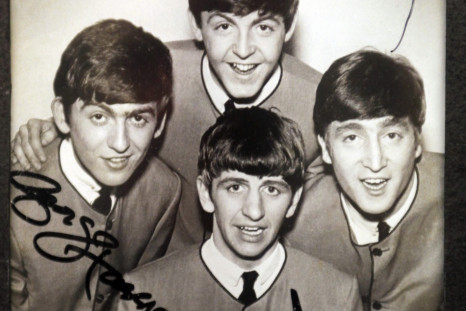 An autographed photo of The Beatles is displayed at an exhibition in Buenos Aires October 4, 2010.