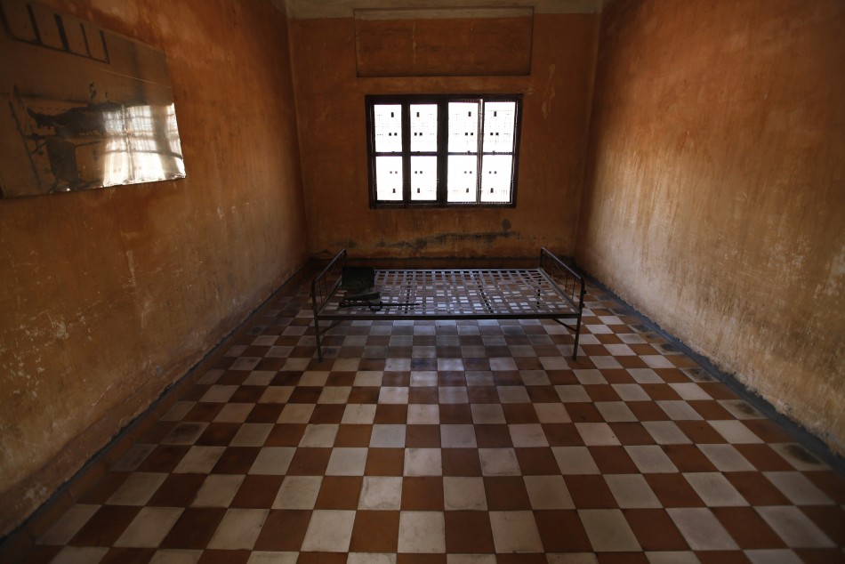 Torture instruments on a bed frame are seen in a room once used as a torture chamber at the Tuol Sleng Genocide Museum in Phnom Penh