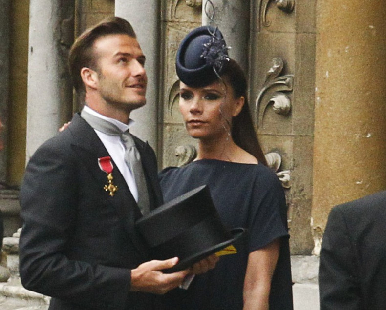 Soccer star David Beckham and his wife Victoria arrive at Westminster Abbey before the wedding of Britain's Prince William and Kate Middleton, in central London