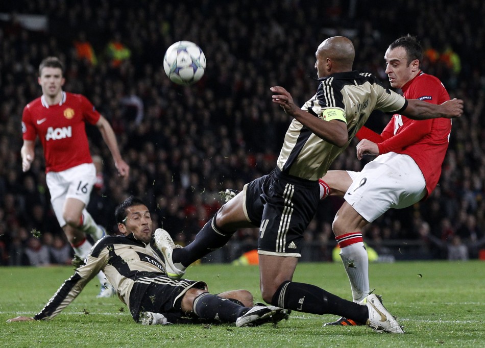 Manchester Uniteds Berbatov shoots at the Benfica goal during their Champions League soccer match